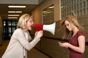 iStock-megaphone-shout-at-teen-000005586427XSmall-300x199.jpg image
